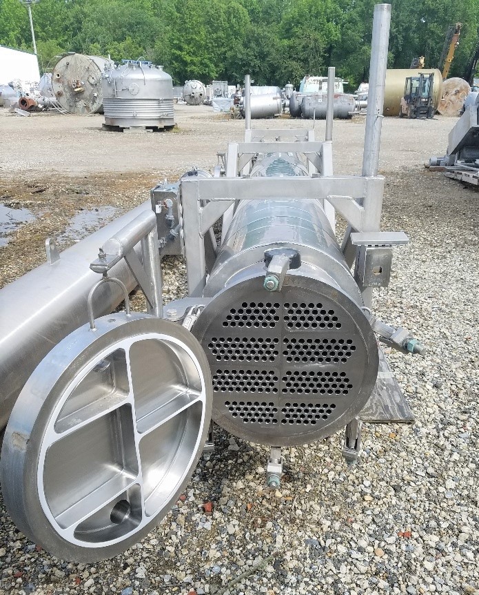 ***SOLD*** used 941 Sq.Ft. Sanitary Shell and Tube Heat Exchanger. Built by Enerquip. Sanitary 304L Stainless Steel. TUBES: (240) 3/4